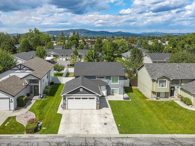 17609 E 2nd Ln, Spokane Valley, WA 99016 - aerial perspective of suburban area with a mountain backdrop