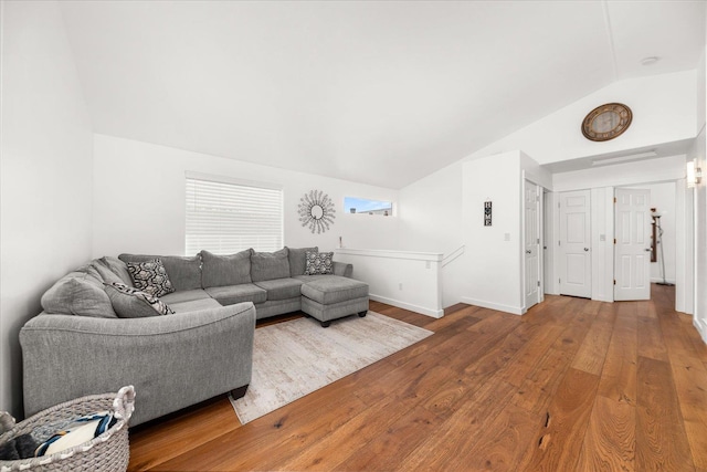 17609 E 2nd Ln, Spokane Valley, WA 99016 - living area with vaulted ceiling and wood finished floors