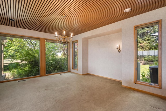 6624 S Ben Burr Rd, Spokane, WA 99223 - carpeted spare room featuring a chandelier