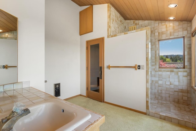 6624 S Ben Burr Rd, Spokane, WA 99223 - bathroom with lofted ceiling, wooden ceiling, recessed lighting, a tile shower, and a tub