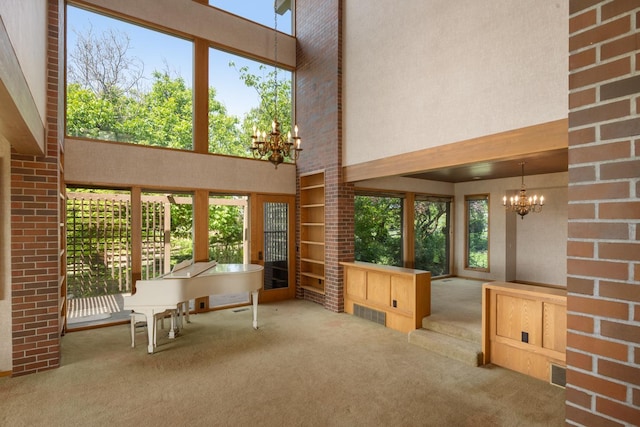 6624 S Ben Burr Rd, Spokane, WA 99223 - sunroom with a chandelier and healthy amount of natural light