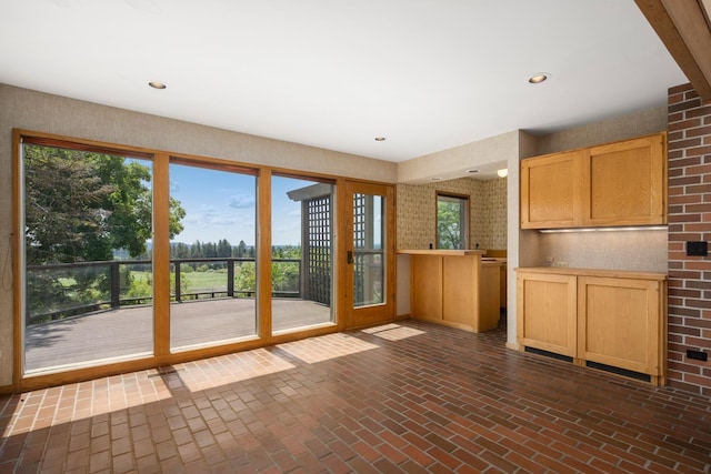 6624 S Ben Burr Rd, Spokane, WA 99223 - doorway to outside with brick flooring and recessed lighting