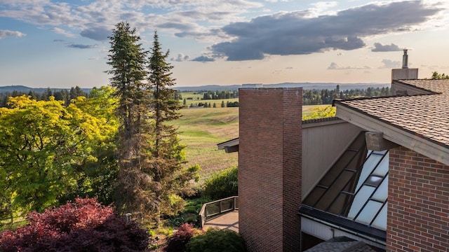 6624 S Ben Burr Rd, Spokane, WA 99223 - exterior view of a chimney and brick siding