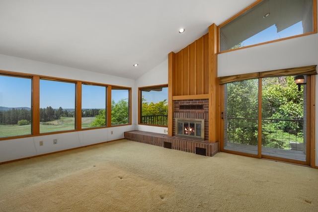 6624 S Ben Burr Rd, Spokane, WA 99223 - unfurnished living room with carpet floors, a brick fireplace, high vaulted ceiling, and recessed lighting