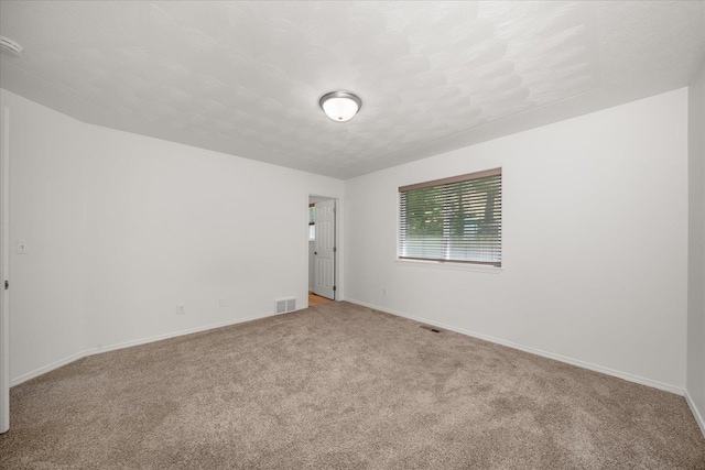 6720 N Royal Ln, Spokane, WA 99208 - carpeted spare room featuring baseboards and a smoke detector