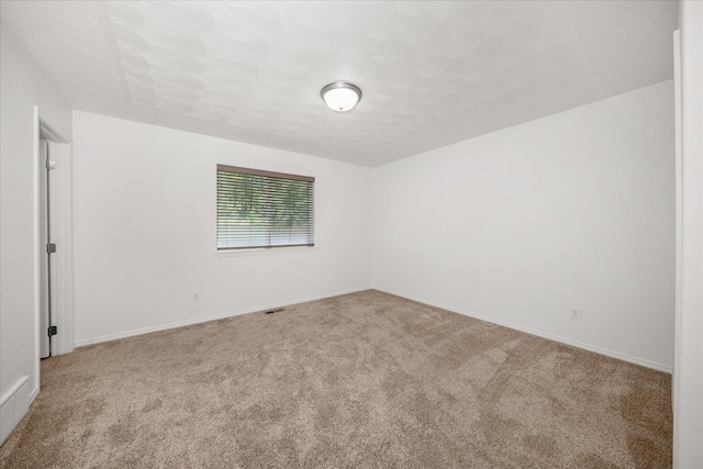 6720 N Royal Ln, Spokane, WA 99208 - carpeted spare room with baseboards