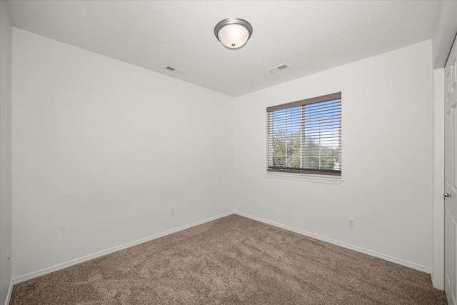 6720 N Royal Ln, Spokane, WA 99208 - carpeted spare room featuring baseboards