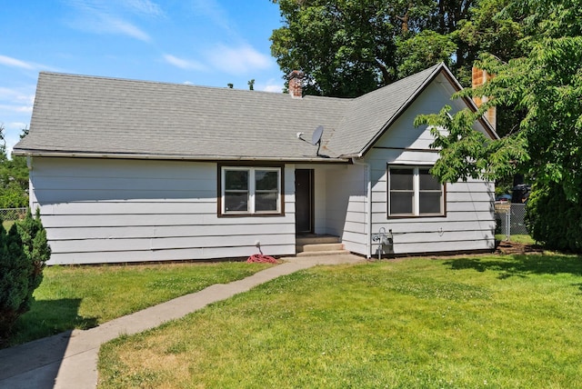 2815 N Bowman Rd, Spokane Valley, WA 99212 - view of front of home with a chimney and a front lawn