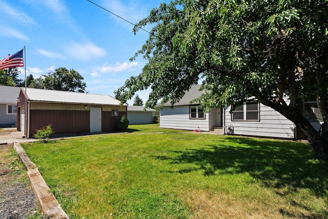 2815 N Bowman Rd, Spokane Valley, WA 99212 - view of grassy yard with an outdoor structure