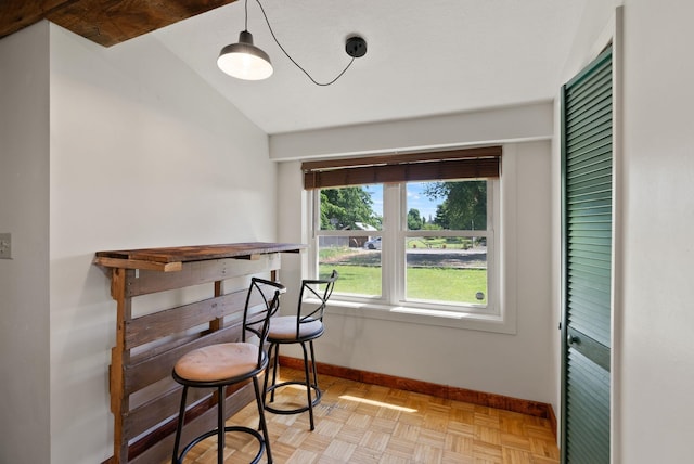 2815 N Bowman Rd, Spokane Valley, WA 99212 - dining room with baseboards and vaulted ceiling