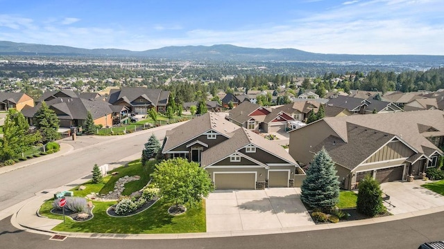 8918 E Clearview Ln, Spokane, WA 99217 - aerial perspective of suburban area featuring mountains