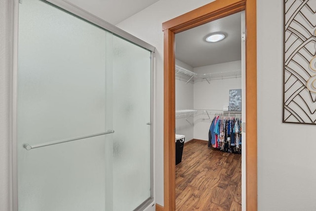 8918 E Clearview Ln, Spokane, WA 99217 - walk in closet featuring wood finished floors