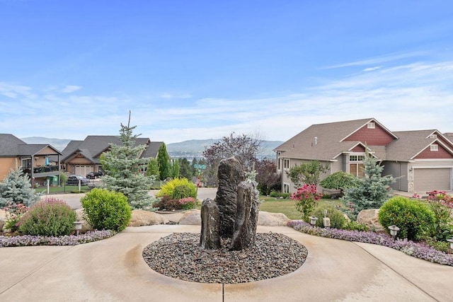 8918 E Clearview Ln, Spokane, WA 99217 - view of community with curved driveway and a residential view