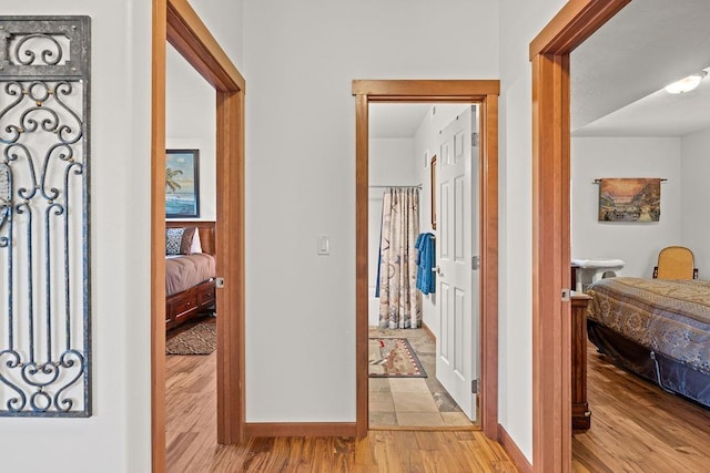 8918 E Clearview Ln, Spokane, WA 99217 - hallway featuring light wood-style floors and baseboards