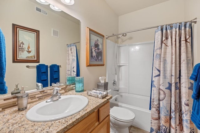 8918 E Clearview Ln, Spokane, WA 99217 - bathroom featuring vanity, shower / tub combo, and tasteful backsplash