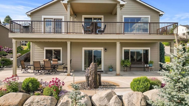 8918 E Clearview Ln, Spokane, WA 99217 - back of property featuring a balcony and a patio