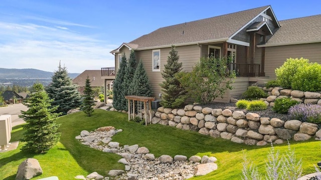 8918 E Clearview Ln, Spokane, WA 99217 - view of property exterior with a yard