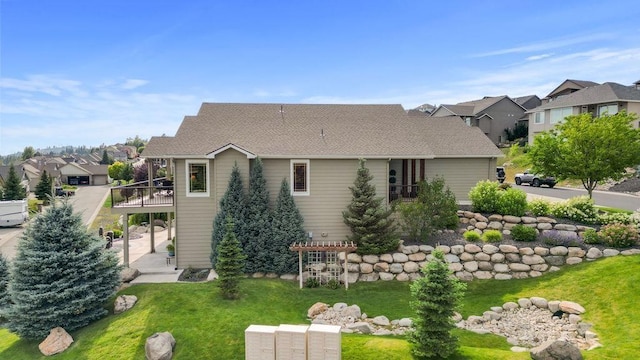 8918 E Clearview Ln, Spokane, WA 99217 - rear view of property featuring a residential view, a yard, a wooden deck, and a patio