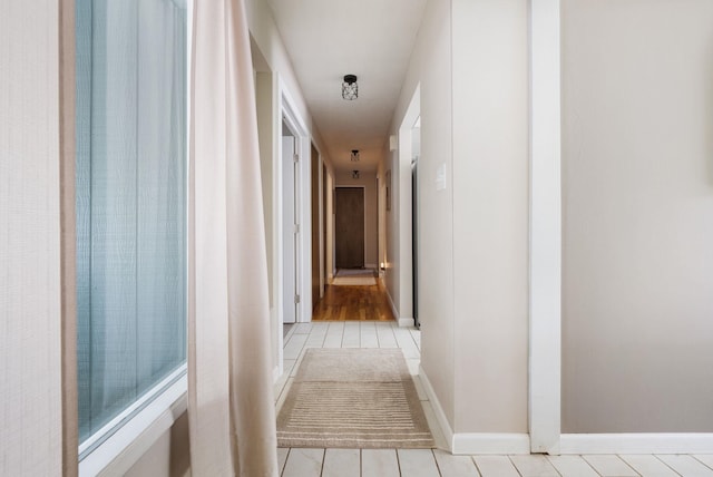 12524 E 20th Ave, Spokane Valley, WA 99216 - hall featuring light tile patterned floors and baseboards