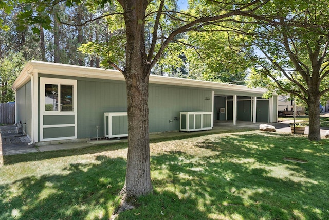 12524 E 20th Ave, Spokane Valley, WA 99216 - rear view of property featuring a yard