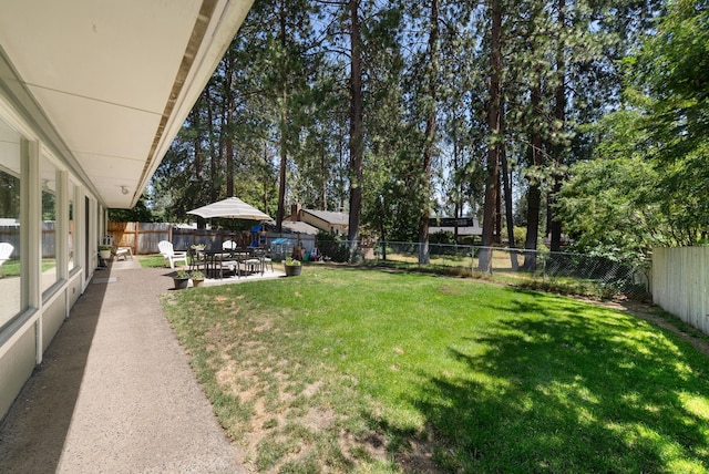 12524 E 20th Ave, Spokane Valley, WA 99216 - fenced backyard featuring a patio area