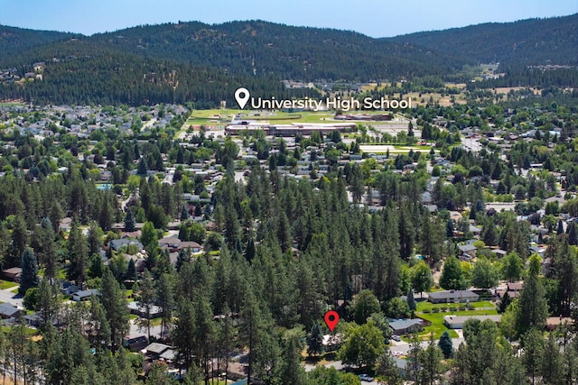 12524 E 20th Ave, Spokane Valley, WA 99216 - aerial overview of property's location featuring a forest and a mountainous background