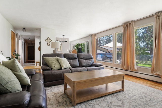 12524 E 20th Ave, Spokane Valley, WA 99216 - living area with light wood-type flooring and a chandelier