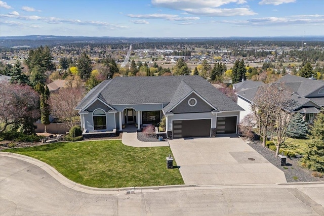 5106 E Glennaire Dr, Spokane, WA 99223 - ranch-style house with a garage, concrete driveway, and a front yard