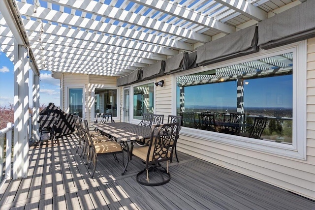 5106 E Glennaire Dr, Spokane, WA 99223 - wooden deck with outdoor dining space and a pergola