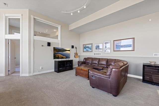 5106 E Glennaire Dr, Spokane, WA 99223 - living area with carpet floors and track lighting