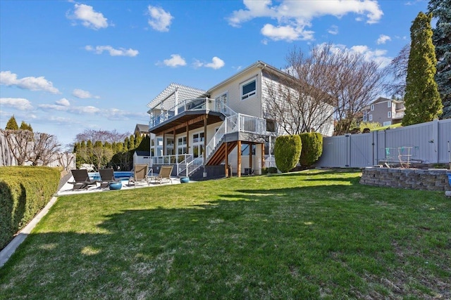 5106 E Glennaire Dr, Spokane, WA 99223 - back of house with stairs, a gate, an outdoor fire pit, a deck, and a patio area