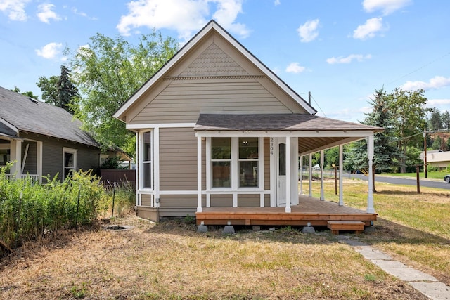 2304 E 6th Ave, Spokane, WA 99202 - rear view of house featuring a yard and a shingled roof