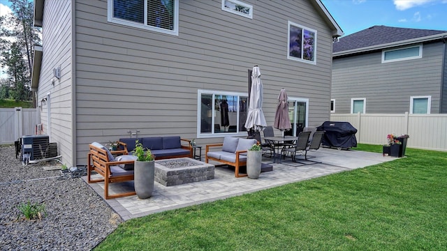 7169 S Parkridge Blvd, Spokane, WA 99224 - rear view of house featuring an outdoor living space with a fire pit and a patio