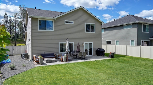 7169 S Parkridge Blvd, Spokane, WA 99224 - back of property featuring a patio, an outdoor living space with a fire pit, a fenced backyard, a gate, and roof with shingles