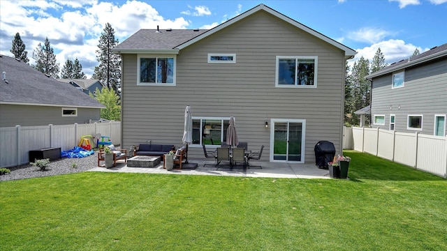 7169 S Parkridge Blvd, Spokane, WA 99224 - back of property with an outdoor living space, a patio area, and a fenced backyard
