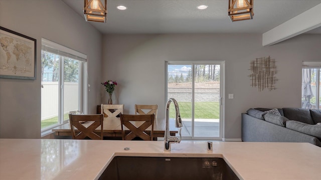7169 S Parkridge Blvd, Spokane, WA 99224 - kitchen with light countertops, recessed lighting, and open floor plan