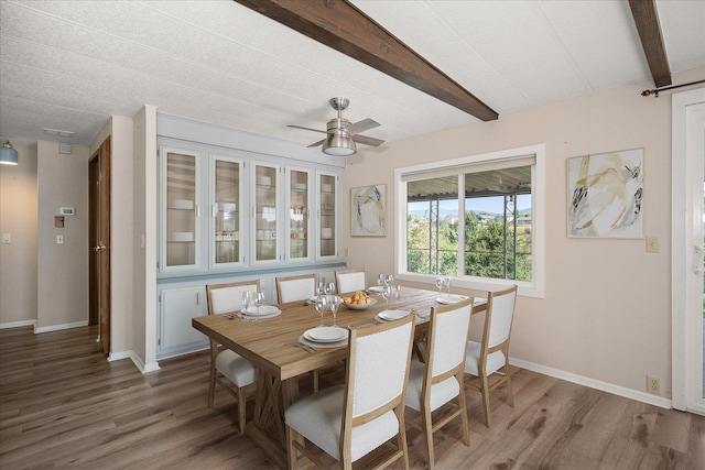 18822 E Montgomery Dr, Otis Orchards, WA 99027 - dining space featuring beam ceiling, wood finished floors, and ceiling fan