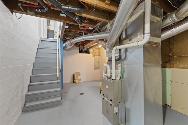 2224 N Lily Rd, Spokane, WA 99212 - unfinished below grade area with stairway, electric panel, and concrete block wall