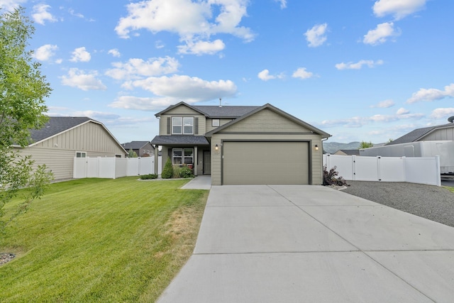 1024 W Staples Rd, Post Falls, ID 83854 - view of front of house featuring concrete driveway, an attached garage, a gate, and a shingled roof
