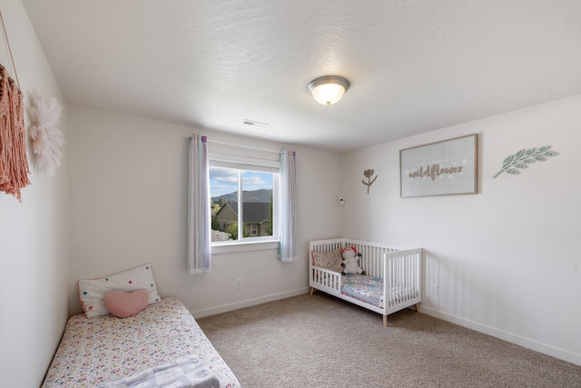 1024 W Staples Rd, Post Falls, ID 83854 - bedroom featuring carpet flooring and baseboards