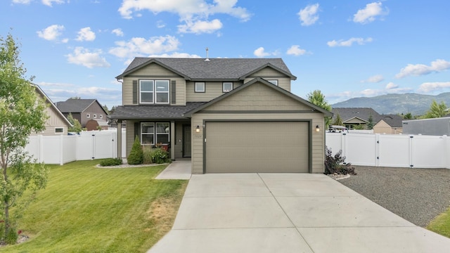 1024 W Staples Rd, Post Falls, ID 83854 - view of front of house featuring a gate, concrete driveway, an attached garage, and roof with shingles