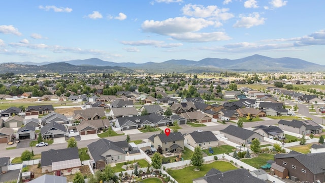 1024 W Staples Rd, Post Falls, ID 83854 - aerial perspective of suburban area with a mountainous background