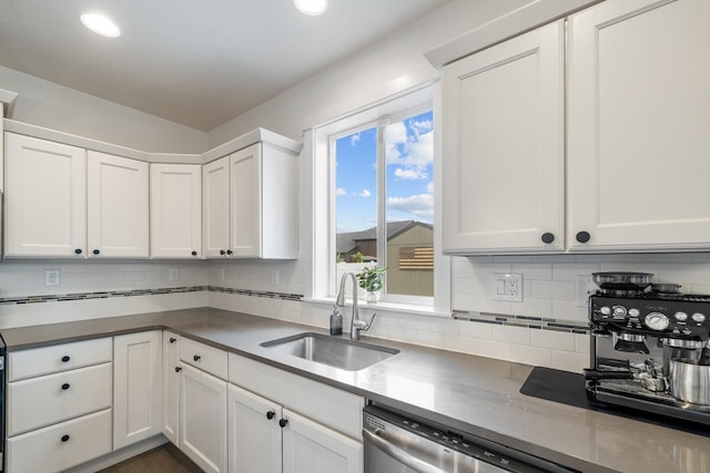 1024 W Staples Rd, Post Falls, ID 83854 - kitchen featuring decorative backsplash, white cabinets, recessed lighting, and dishwasher