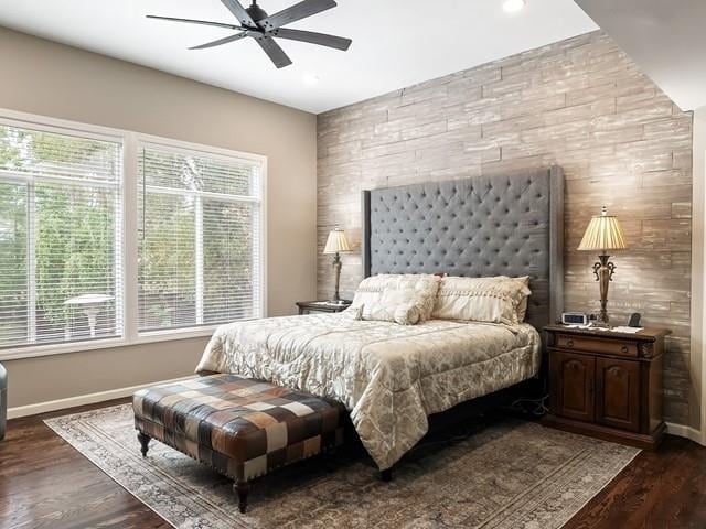 4332 S Greystone Ln, Spokane, WA 99223 - bedroom featuring an accent wall, dark wood-type flooring, a ceiling fan, wood walls, and recessed lighting