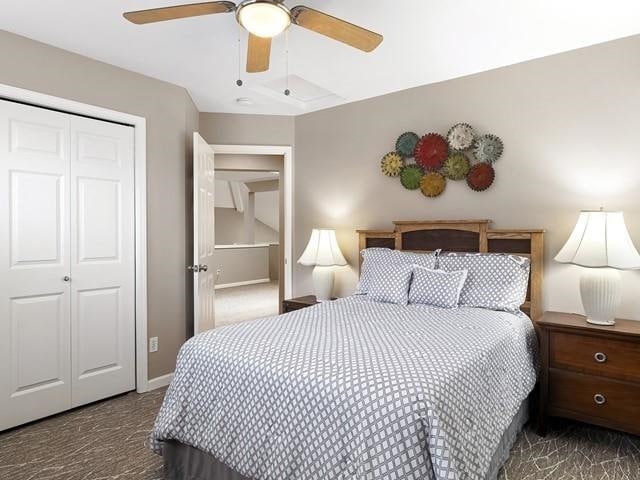 4332 S Greystone Ln, Spokane, WA 99223 - carpeted bedroom featuring a closet and a ceiling fan