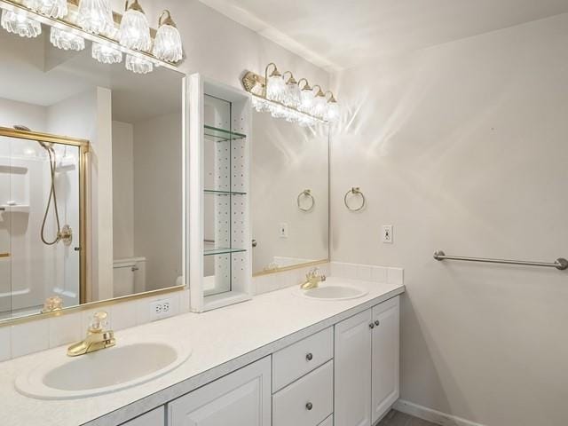 4332 S Greystone Ln, Spokane, WA 99223 - full bathroom featuring double vanity and a stall shower