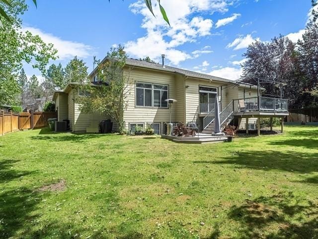 4332 S Greystone Ln, Spokane, WA 99223 - rear view of property with a wooden deck, a fenced backyard, and stairway