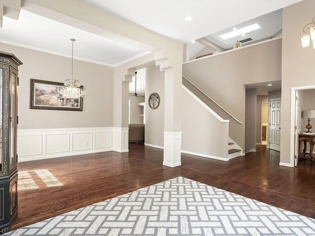 4332 S Greystone Ln, Spokane, WA 99223 - foyer featuring wood finished floors, stairway, and a chandelier