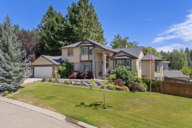 5808 N Hermosa Cir, Otis Orchards, WA 99027 - view of front of house with an attached garage, concrete driveway, stone siding, and a chimney