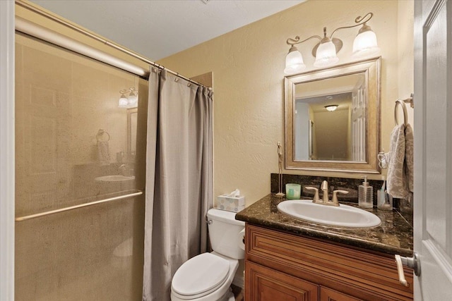 5808 N Hermosa Cir, Otis Orchards, WA 99027 - bathroom with a textured wall, vanity, and a shower with shower curtain